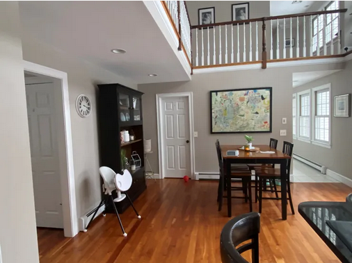 A room with wooden floors and walls.