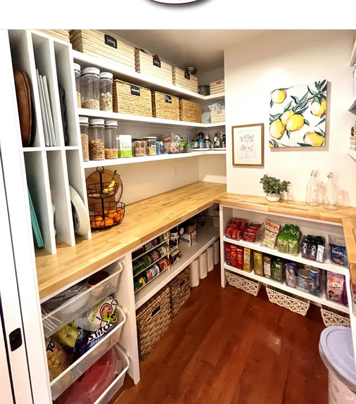 A pantry with lots of shelves and baskets.