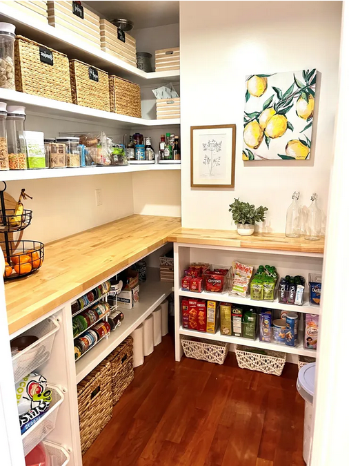 A pantry with lots of food and shelves.