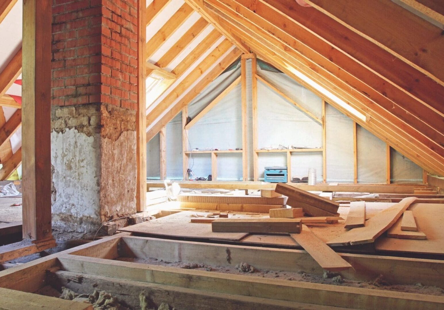 A room with many wooden beams and walls.